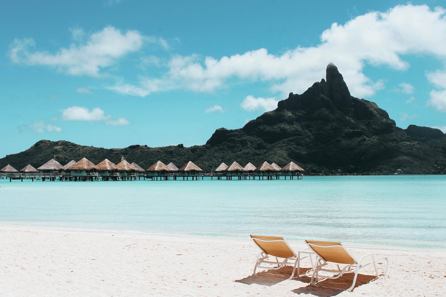 an island withDo You Need Water Shoes In Hawaii cottages and beach chairs