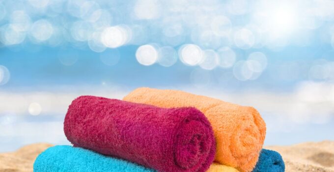 How to Roll a Beach Towel Best Way to Fold Beach Towel to Save Space