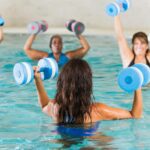 How To Exercise With Water Dumbbells